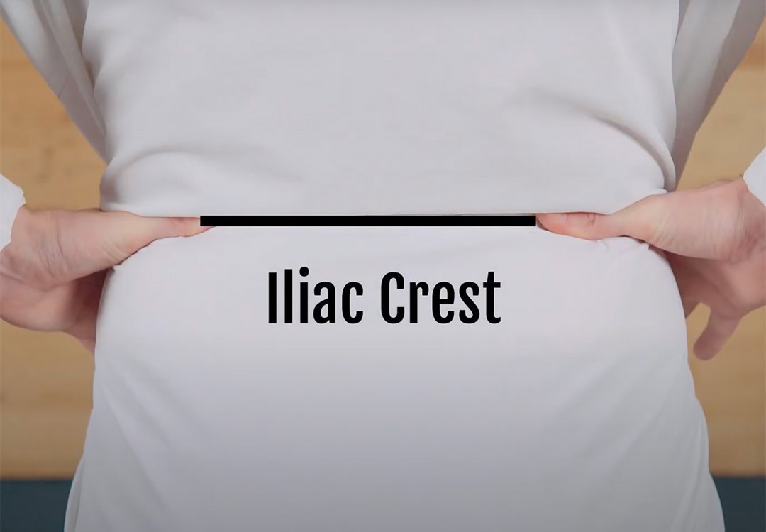 Screenshot 2025-01-15 at 13.07.41 Backpacker reaches for his bear spray from the ULA Deploy Bear Canister Holder on his shoulder strap.