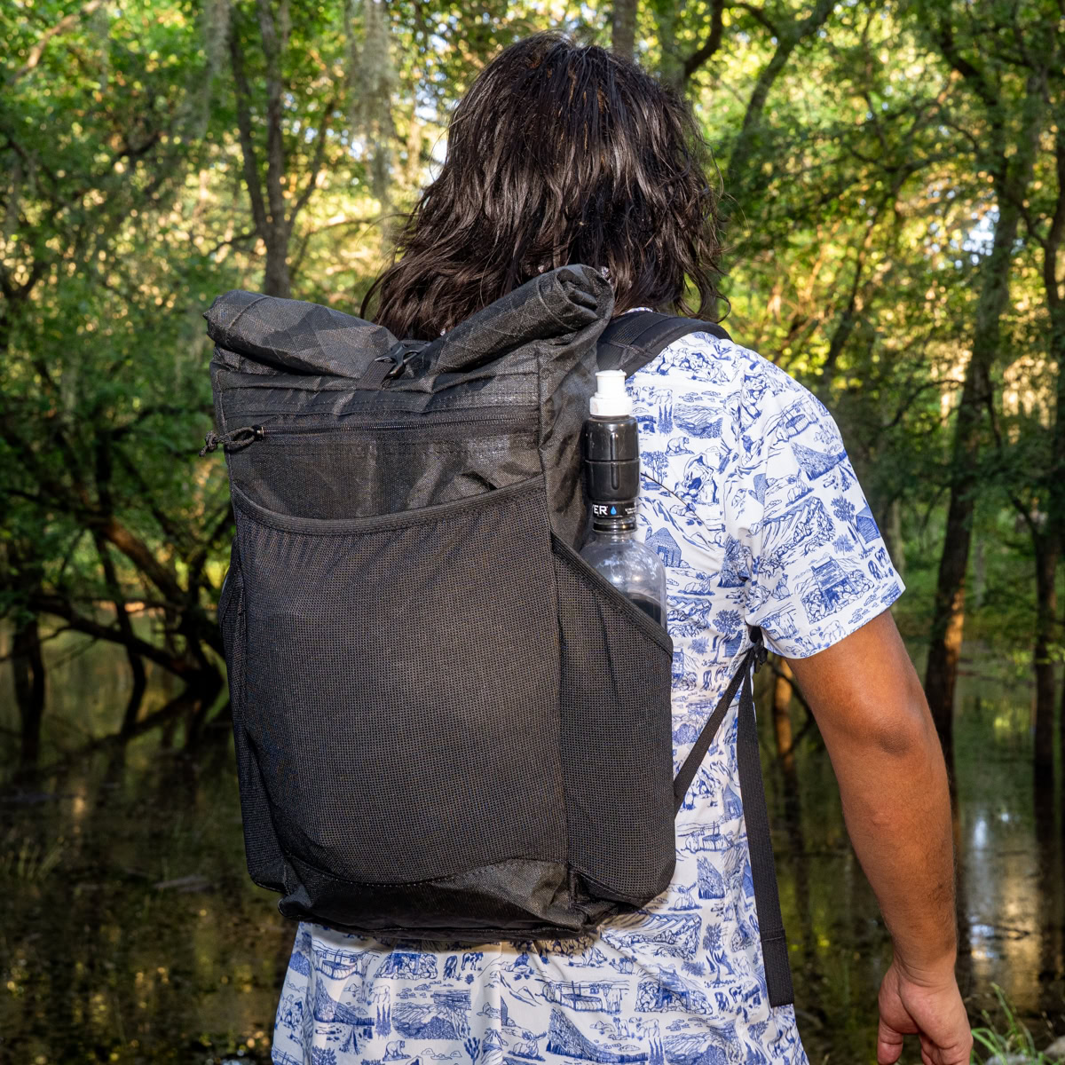 A man with an ultra Node is outside